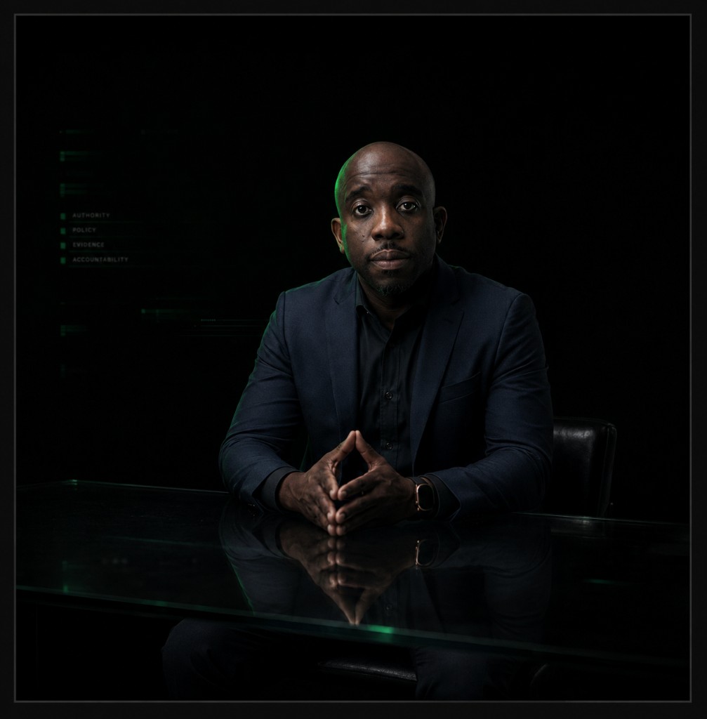 Portrait of the founder of Nine Mile Security Group, with the words Authority, Policy, Evidence, and Accountability.
